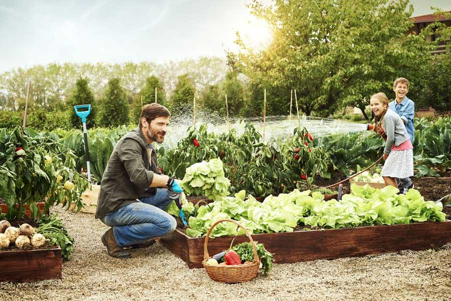 Gardena family in garden